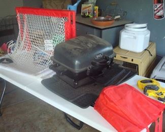 Grill and child hockey set.
