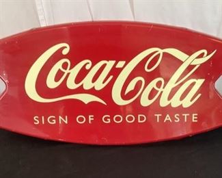 Vintage Metal Coca Cola Sign
Coca Cola "Sign of Good Taste". Some minor marking. Measures 12" H x 24" W