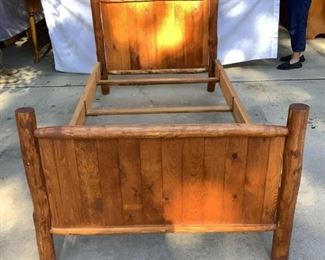 Vintage Log Cabin Style Bed
Twin log bed frame - 35" H x 80" W x 80.5" D. Minor wear from age. Good Condition. Inside diameter for mattress is 39.5"