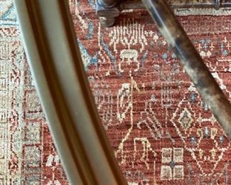 Faux tortoise bamboo cocktail table with brass-rimmed glass topper. Measures 44.5"W x 13" H x 31" D. Photo 3 of 3. 