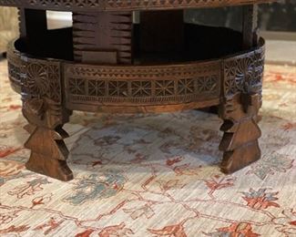 Antique carved wood grinding wheel repurposed as a coffee table. Measures 40" D x 18" H. Photo 2 of 3. 