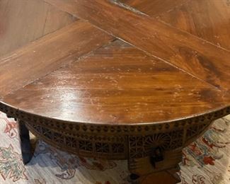 Antique wood grinding wheel repurposed as a coffee table. Measures 40" D x 18" H. Photo 3 of 3. 