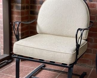 Wrought iron spring rocker chair - 2 available.  Cushions are in pristine condition. Photo 1 of 2. 