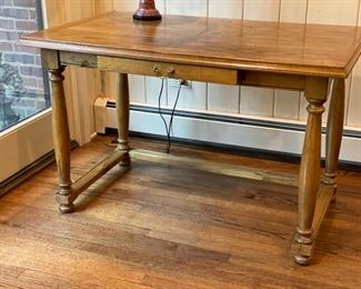 Vintage writing desk with single drawer. Measures 46" W x 29" D x 30" H. 