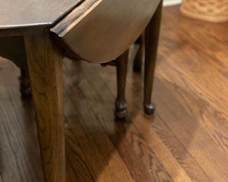 Drop-leaf dining table. Measures 43.5" D x 28" H. It's 27" W with both sides down and extends to 63.5" oval shape with two 10" leaves. Photo 2 of 2. 