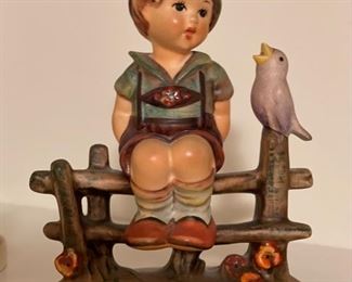 Hummel Goebel Boy on Fence with Blue Bird. 