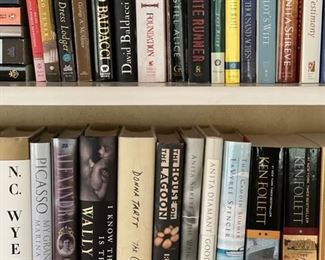 Sample of hardback and paperback books. Photo 1 of 2. 