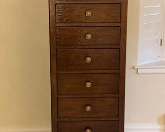 Lingerie chest with decorative pulls. Measures 60" H x 19" D x 23" W. Photo 1 of 2. 