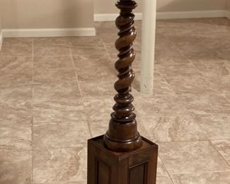 Pair of antique barley twist pedestal plant stands. Each measures 39" H with a 11" x 11" base. 