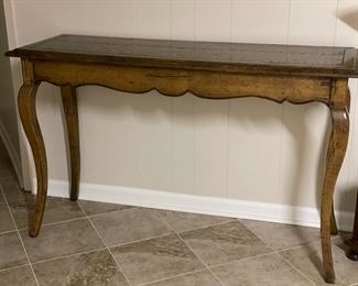 Wood console. Measures 50" X 17" D x 31" H. Leave as is or paint for a more modern look and feel. 