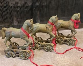 Set of Three Brass Horses. 