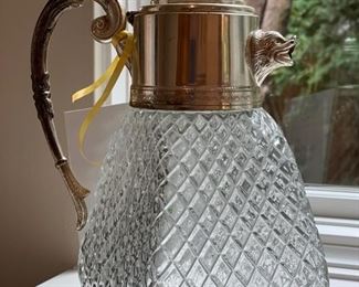 Cut glass and silver plate pitcher. 