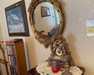 Bubble mirror in gold Eagle frame -- mirror cracked