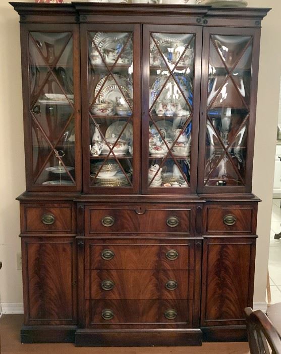 FLAME MAHOGANY MID-CENTURY DISPLAY CABINET WITH BUTLER'S DESK AS TOP DRAWER: PUFFED (or Pillow) GLASS DOORS,  5 ADDITIONAL DRAWERS, STORAGE BEHIND TWO DOORS WHICH CONCEAL MULTIPLE SHELVES. SUPERIOR PIECE OF MID CENTURY CRAFTSMANSHIP!! CERTIFIED MAHOGANY CONSTRUCTION.
