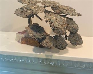 Signed metal sculpture