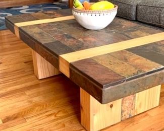 Handcrafted wood and slate coffee table.