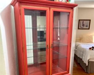 This curio cabinet has great colors and will make an excellent accent piece in any home.