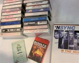 Assorted audio cassette and NSYNC VHS tapes