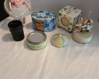 Boy and girl on musical carousel, top has been glued, porcelain doll on stand, more