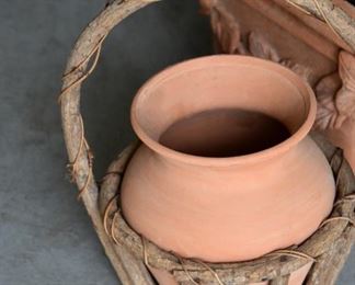 terracotta vase and vine