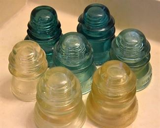 glass insulators (used in telegraph and telephone networks of yesteryear) 