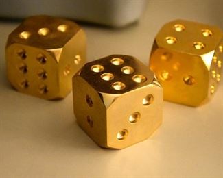"golden" dice, metal, larger than real dice (branded, but otherwise decorative)