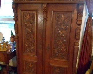 Antique European armoire (breaks down into several pieces for easy transport)