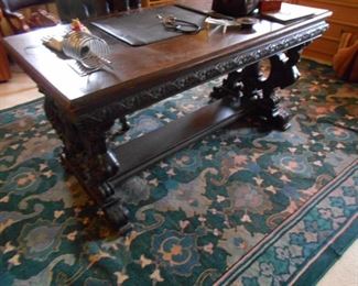 Antique carved desk with ladies busts