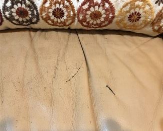 Though largely very good - excellent condition, there is some wear (usage) that ought to be corrected with some leather repair kit.