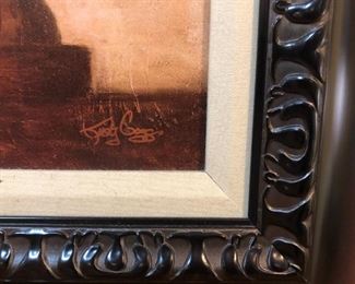 Close-up view of wood frame and artist signature