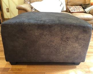 Micro fiber  ottoman measures 18"H x 32"D x 32"W.