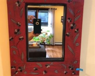 Decorative mirror is 20"H x 16"W