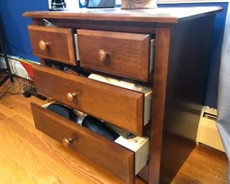 Four drawer wood dresser - side view