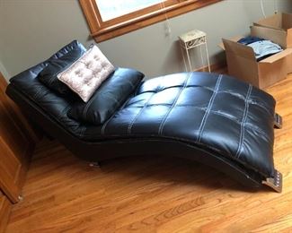 Leather recliner - pillows included. Measures 30"H x 88"D x 28"W