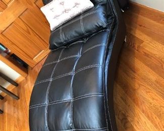 Leather recliner - pillows included. Measures 30"H x 88"D x 28"W