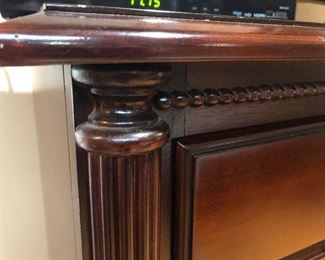 Solid wood dresser complete with mirror. Mirror is 42"H x 28"W. it rests atop this 7-drawer dresser that measures 32"H x 18"D x 56"W