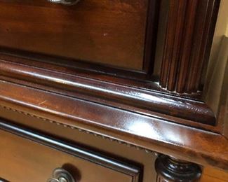 Solid wood dresser complete with mirror. Mirror is 42"H x 28"W. it rests atop this 7-drawer dresser that measures 32"H x 18"D x 56"W