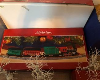 The Village collection of St Nicholas Square comes complete with Country Barn, Firehouse, Candy Store, Holiday Train set, Tree, Log Cabin - about a dozen pieces in all