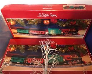 The Village collection of St Nicholas Square comes complete with Country Barn, Firehouse, Candy Store, Holiday Train set, Tree, Log Cabin - about a dozen pieces in all