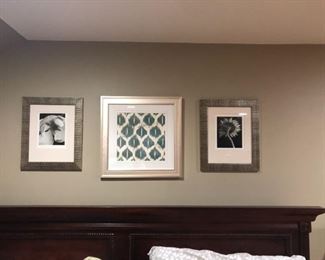 assortment of framed pictures