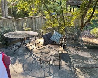 Vintage wrought iron patio set - Table, 4 chairs, two loungers. Needs a little TLC, but works! 
