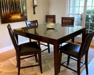 54” square and 36” tall table with 4 stools
