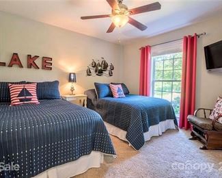 Two full size beds, mattresses, boxsprings, & linens