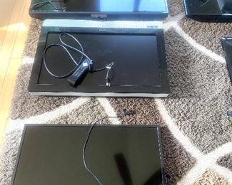 various TVs (wall mounts not included)