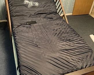 ProBasics Twin Size Electric Full Motorized Hospital Bed w/ Solace Gel Mattress Overlay.