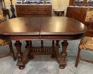 2- $1,095. French Henri II  walnut oval table and six chairs. 
table • 29high 51 wide 45deep
chairs  • 38high 17wide 19deep