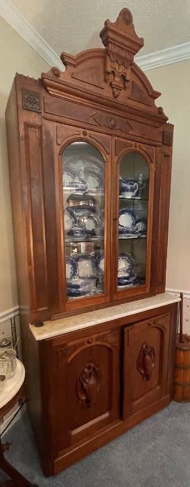 #120 - $1,495. 19th century Hunting cabinet walnut and carved birds on doors.   • 99high 41wide 23deep