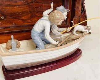 #71 - $275 Lladro Fishing with Gramps #5215 with wooden stand  • 9high 14wide 7deep