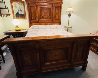 #97 - $2,995. - Exquisite C.1865 Victorian Roccoco 
4 pieces bedroom suite:
1-High back bed with mattress • 85high 62wide 84deep 
2- The Washstand with marble top • 76high 36wide 20deep
3- the Dresser 5 drawer dresser with swinging mirror • 79high 53wide 24deep
4- the Tall chest with six drawers & lockside side • 61high 34wide 20deep