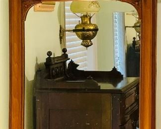 #100 - $195 Walnut lovely mirror with fruit carving on top  • 20 x 33 